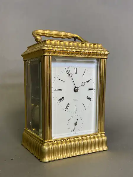 LOVELY MEDIUM SIZED GILT-BRASS FRENCH CARRIAGE CLOCK by FARRET, c. 1870.